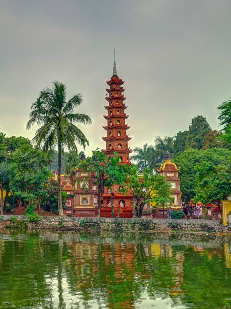 Tran Quoc Pagoda reflected in West Lake, Hanoi, Vietnam